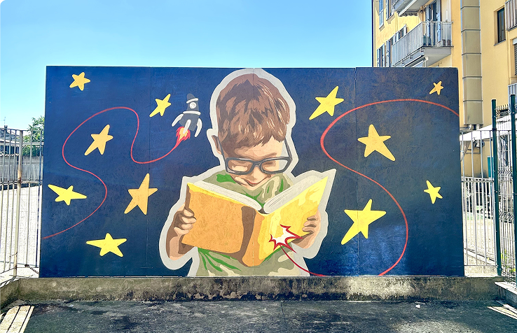 murales su pannelli di compensato realizzato per la biblioteca di zelo buon persico. raffigurante un bambino che legge un libro da cui esce un astronave