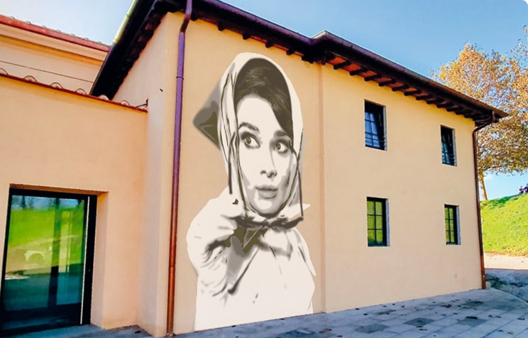 opera murales su una facciata di una biblioteca, raffigurante haudry habourn